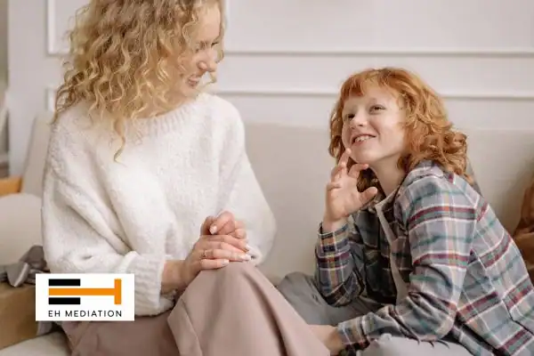Happy mother and child after sorting child arrangements mediation Salford